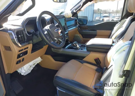 2023 Ford F-150 Lariat from USA, damaged, VIN 1FTFW1ED7PFD04587